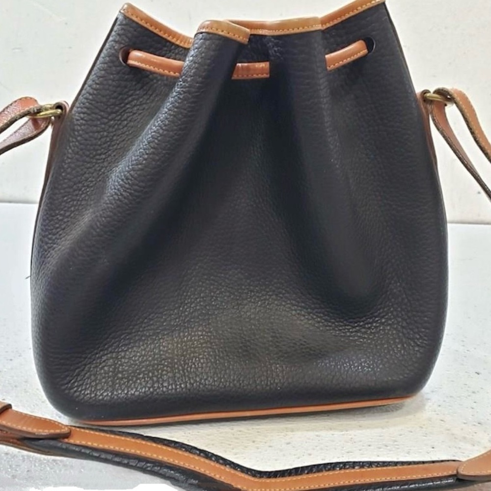 New Dooney & Burke Pebble Grain Leather
Drawstring Crossbody Bucket Bag. - Picture 10 of 16